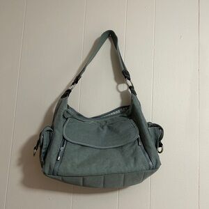 Travelon Light Weighted Multi Pockets Shoulder Bag Size 14”Wx8”Hx5.5”D.